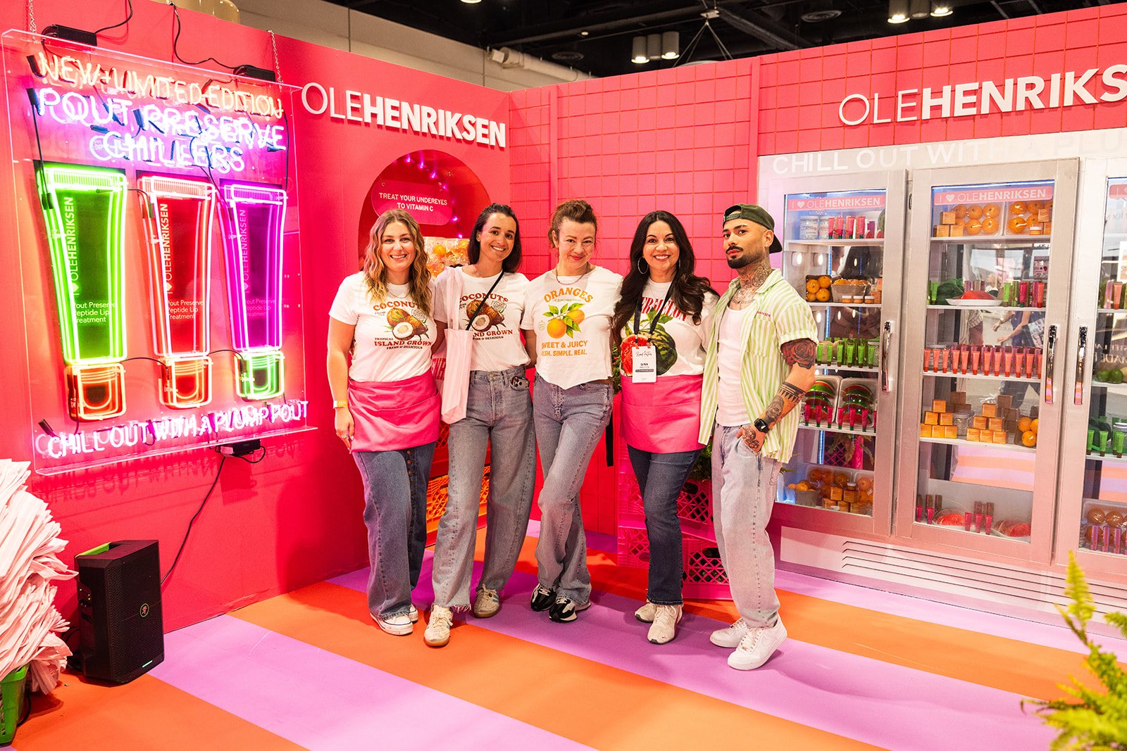 Ole Henriksen team posing in the activation environment