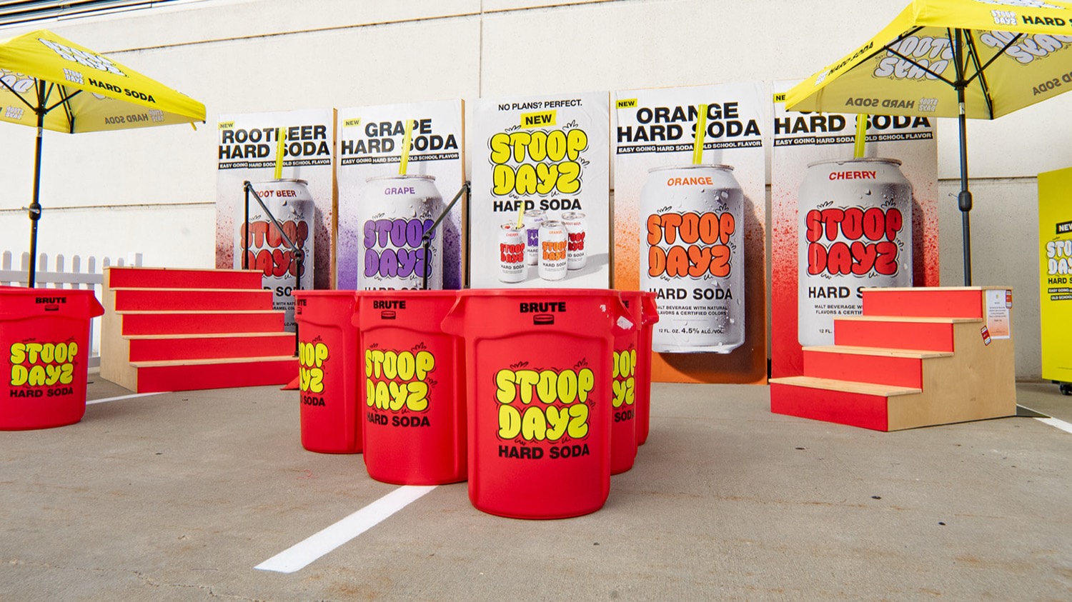Stoop Dayz Hard Soda branded product display with SKU posters and red branded barrels