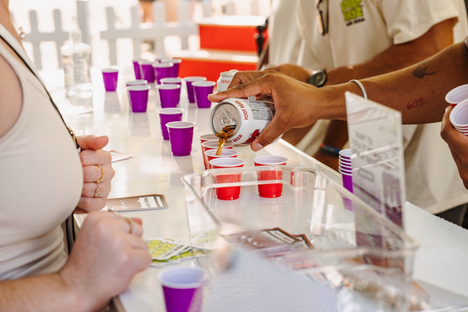 Stoop Dayz Hard Soda being poured into sample cups at the activation bar
